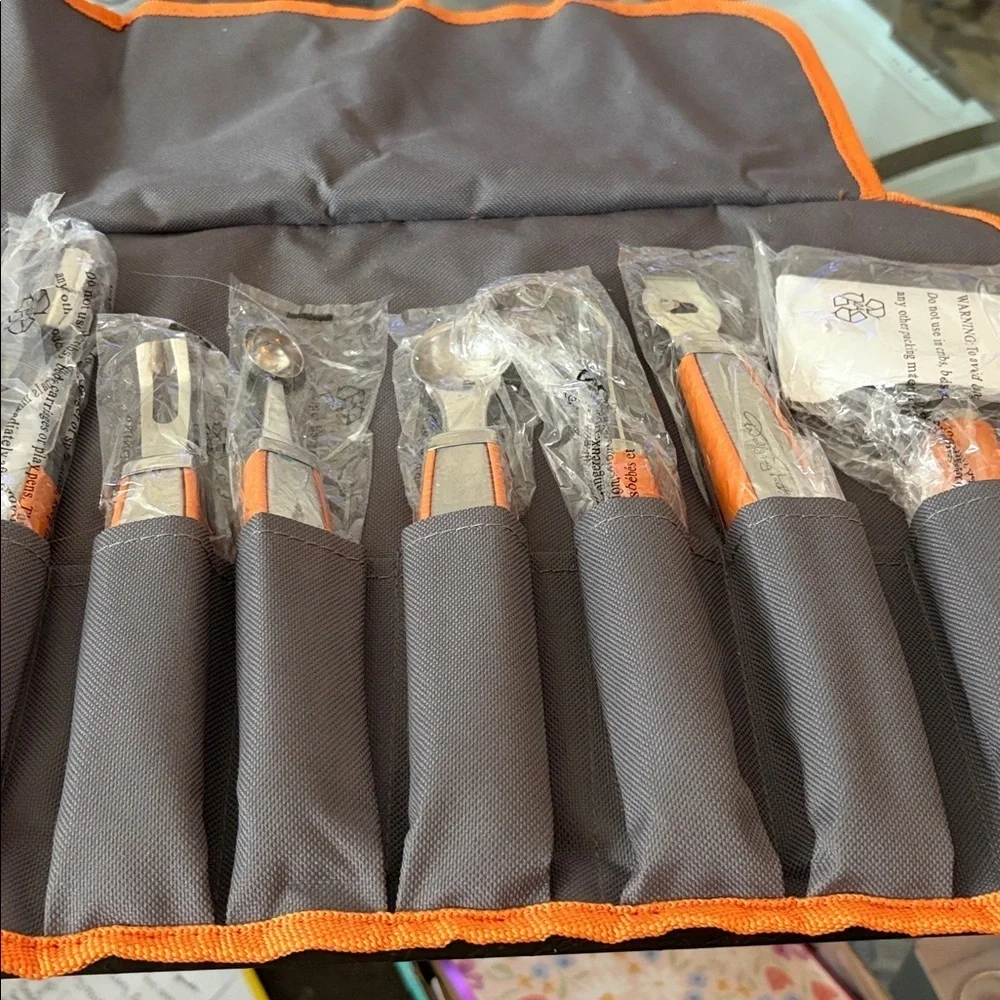 New no tags Wolfgang Puck stainless steel 9 piece garnishing set in roll up bag